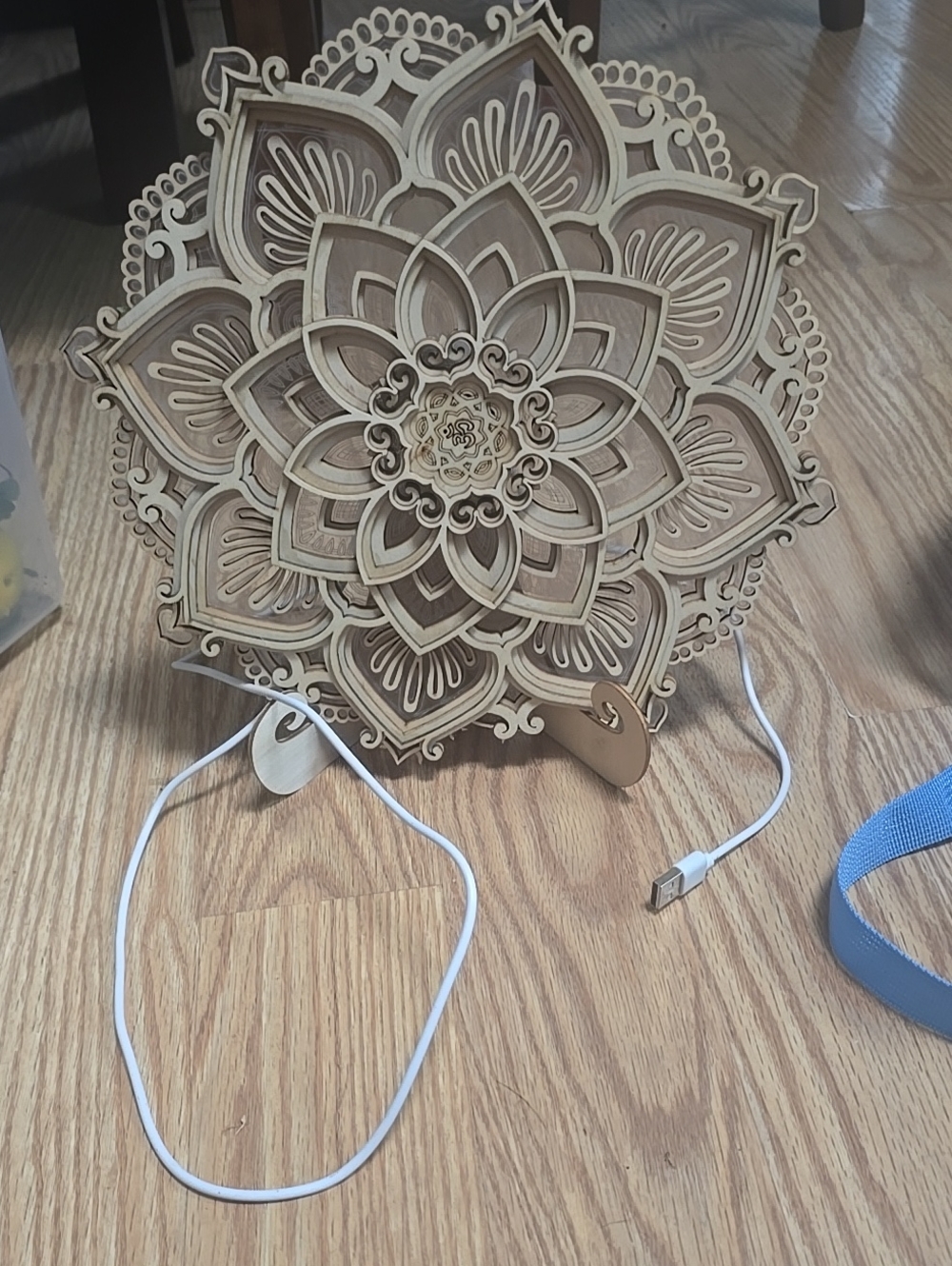 Intricate Layered Wooden Mandala Lights Up